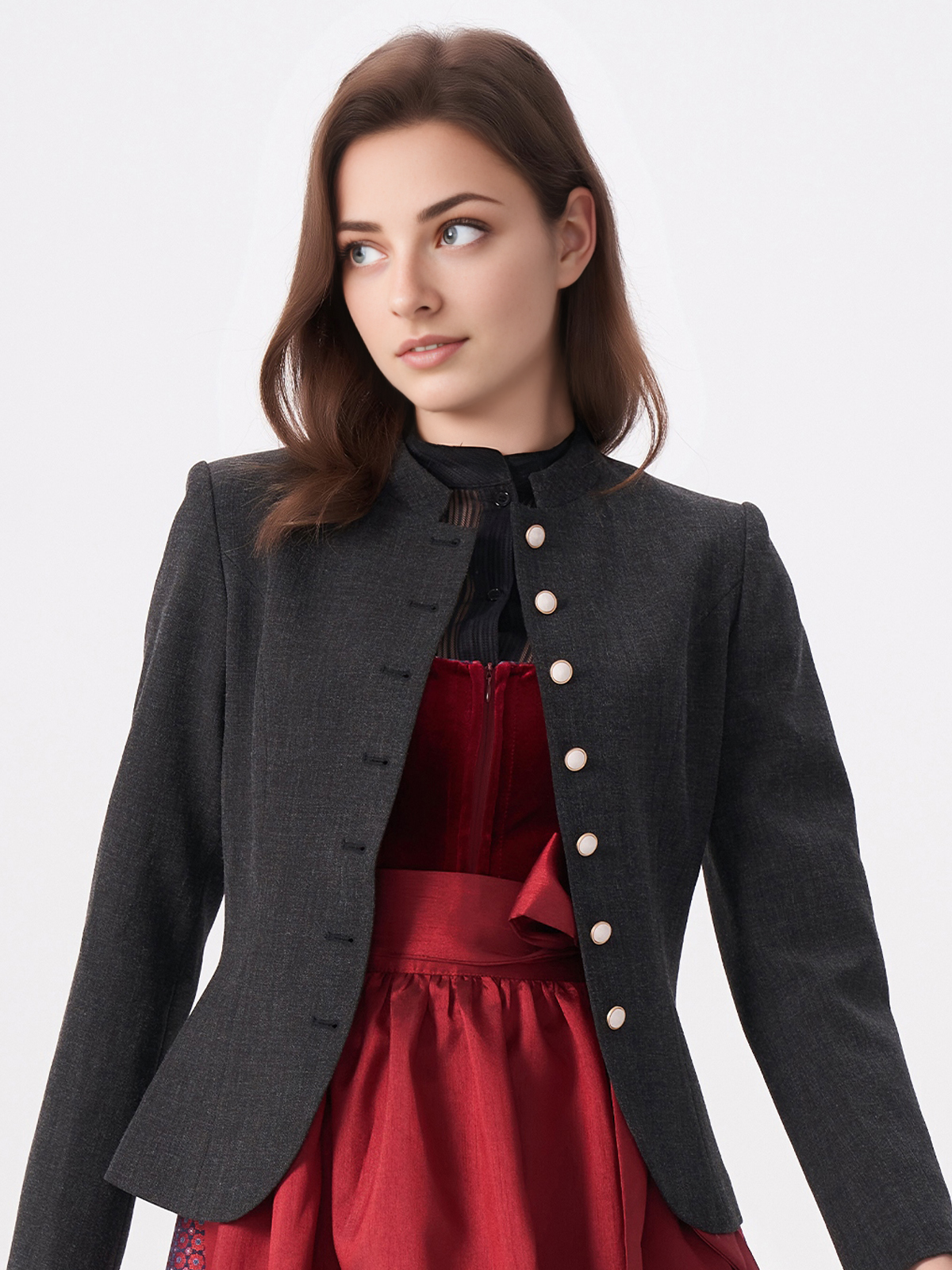 Ein elegantes schwarzes Dirndl mit bestickter Schürze