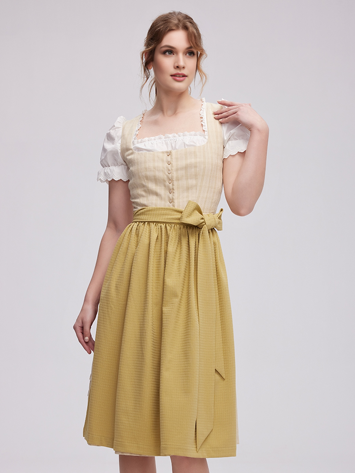 Elegantes Dirndl in erdigem Grün mit braunen Akzenten