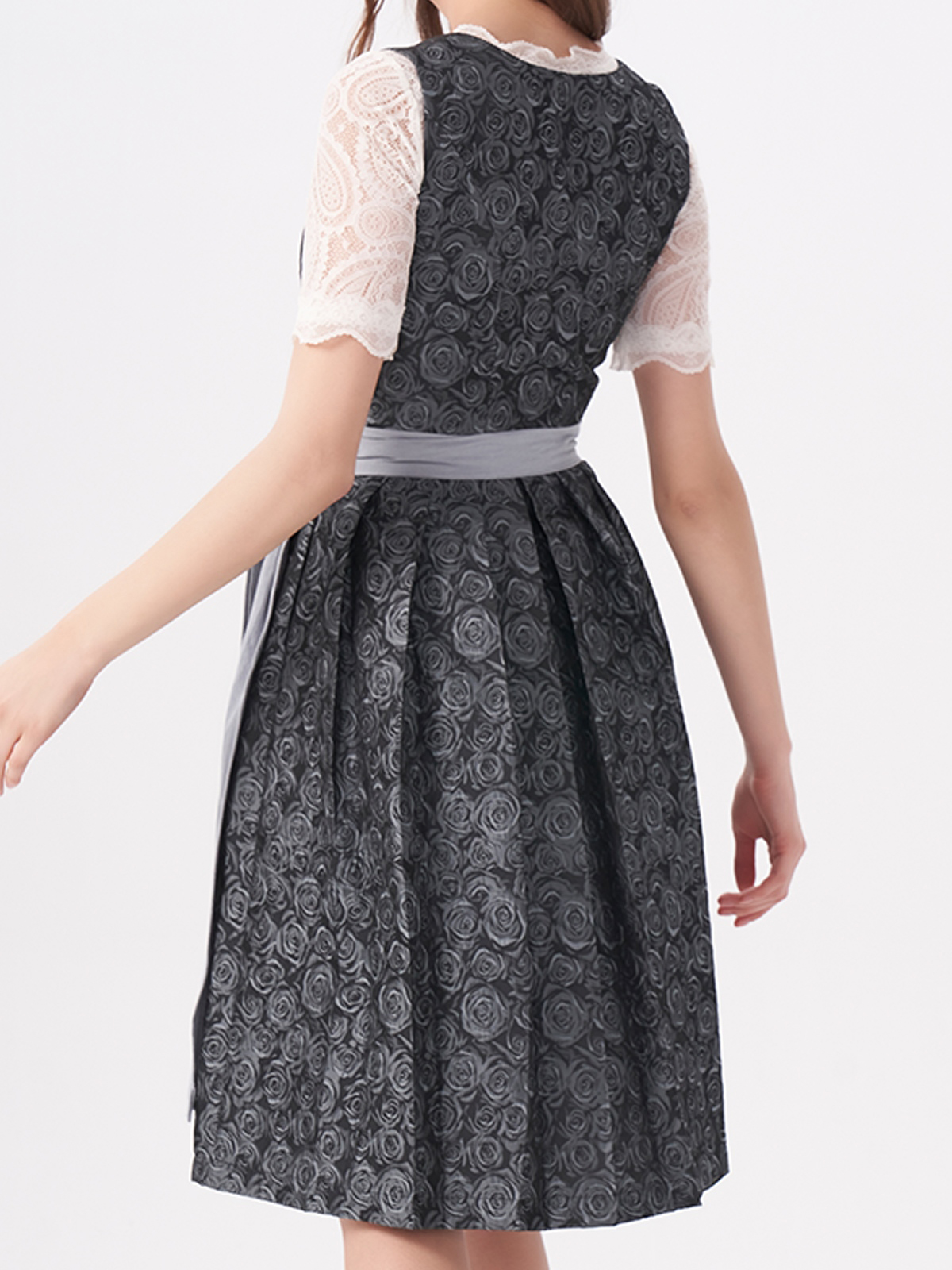 Modernes blaues Dirndl mit floralen Details