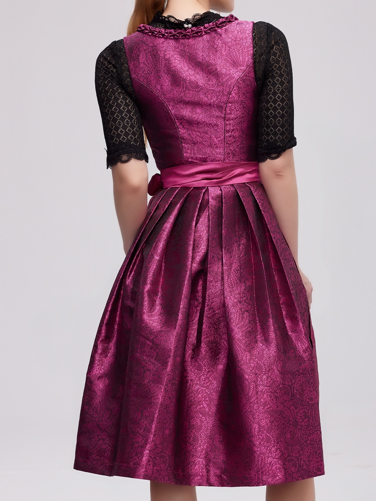 Gelbes Dirndl mit pinken Akzenten